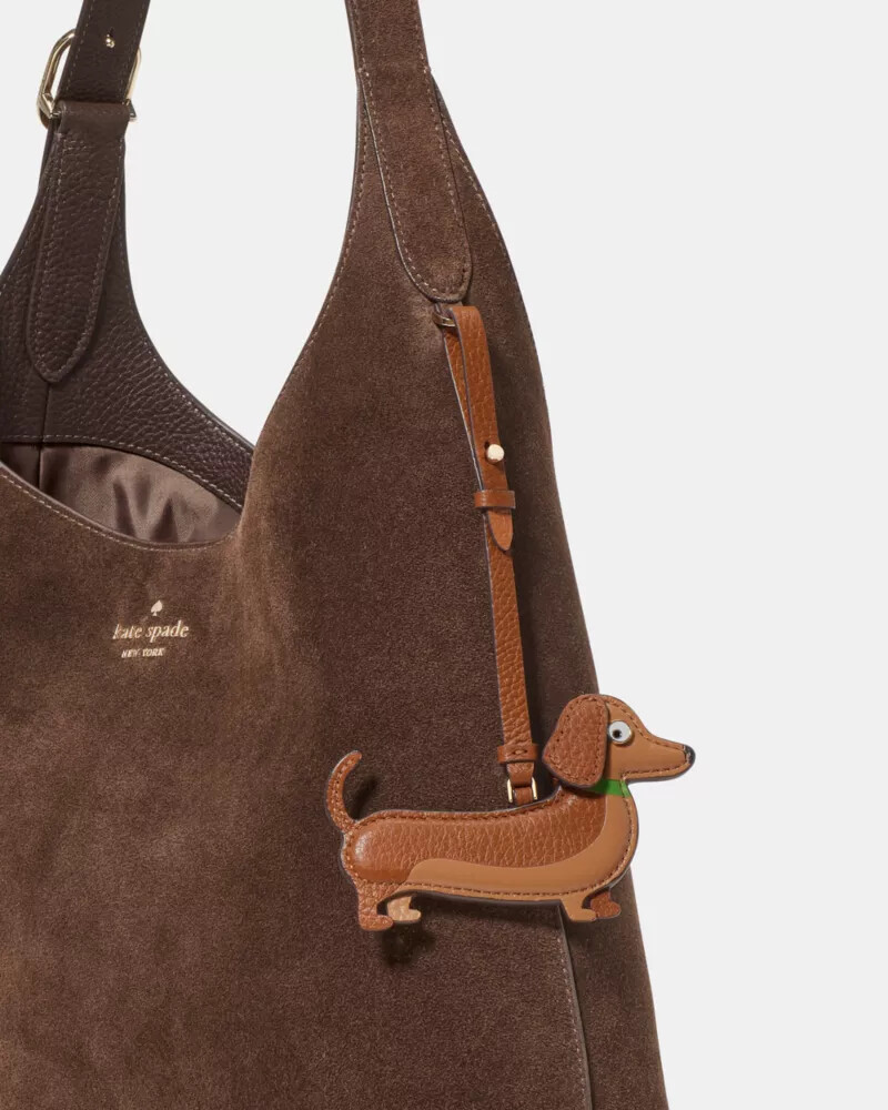 pingente de cachorro para bolsa cor de gengibre quente.