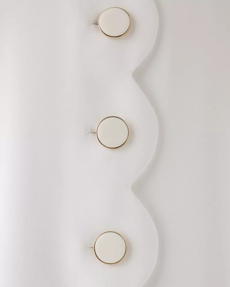 creme para vestido evasê com estampa de vieira