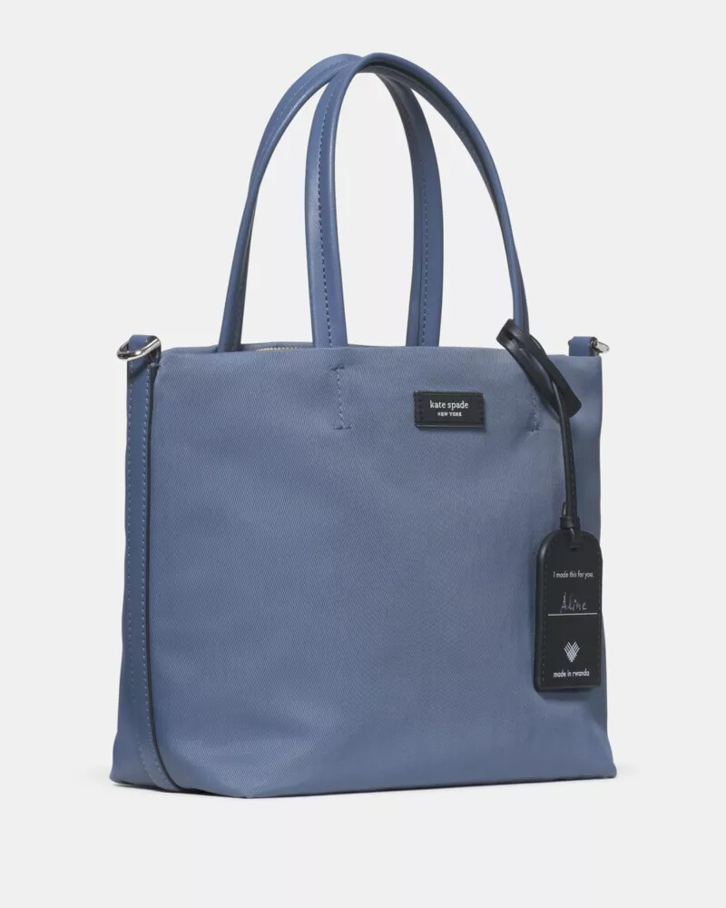 bolsa transversal on purpose cor cinza-claro.