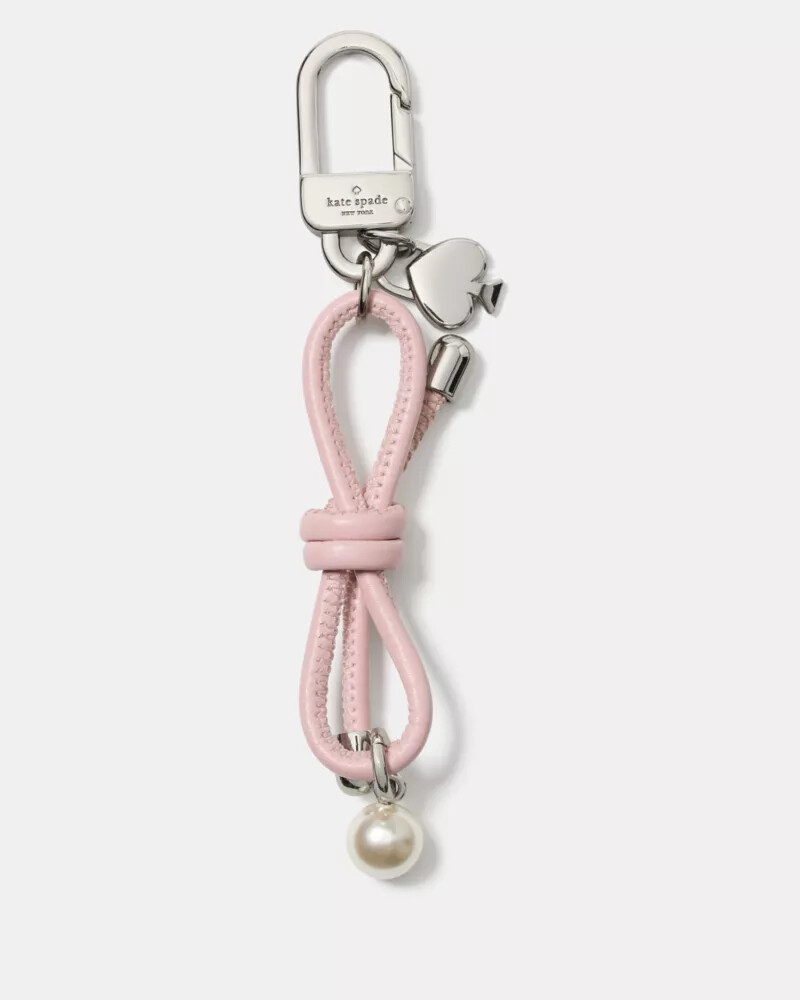 pingente de bolsa com laço e pérolas artificiais estilo tutu rosa.