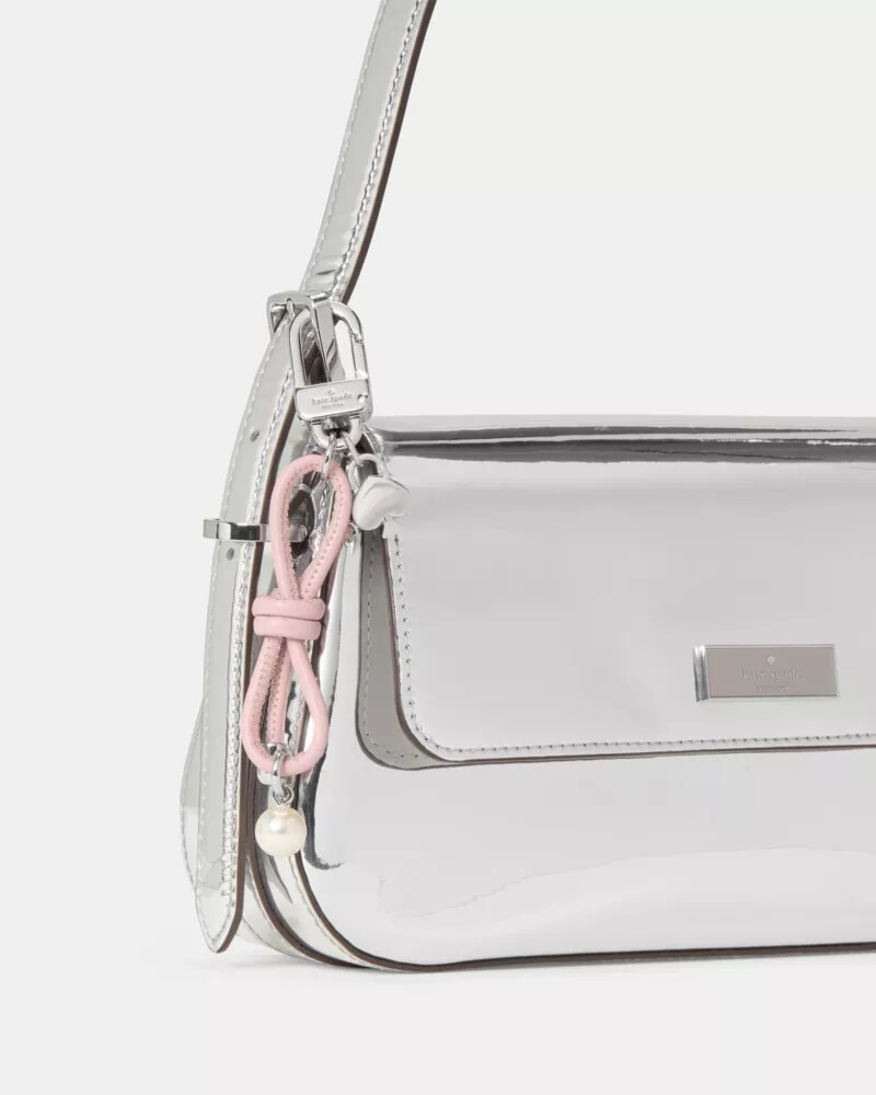 pingente de bolsa com laço e pérolas artificiais estilo tutu rosa.