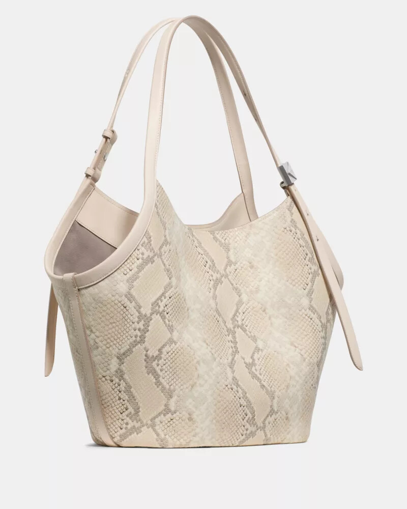 bolsa tote tulipa com estampa de cobra decorativa em tons neutros e multicoloridos.