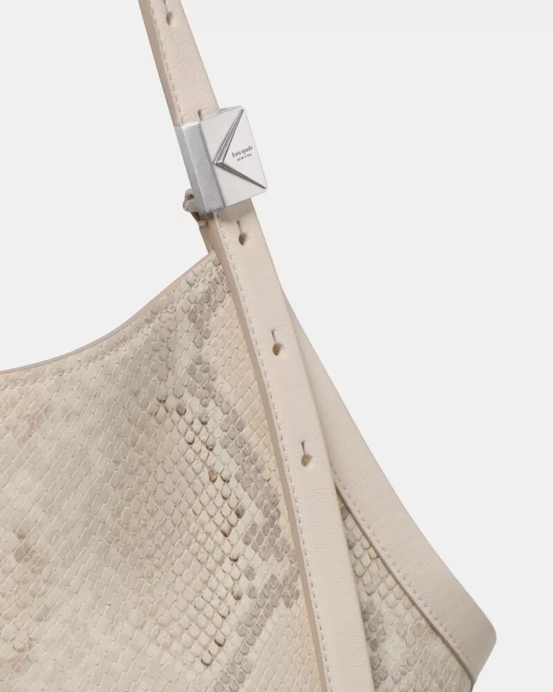 bolsa tote tulipa com estampa de cobra decorativa em tons neutros e multicoloridos.