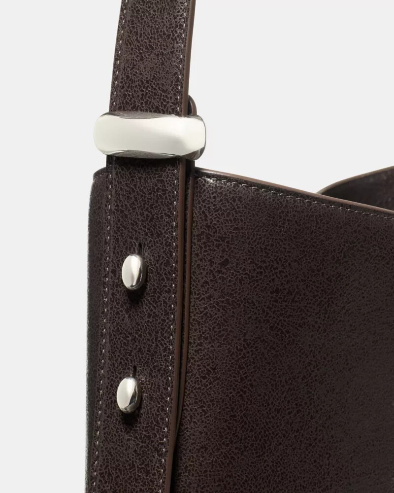 bolsa de couro vidrado halo com cobertura de chocolate quente