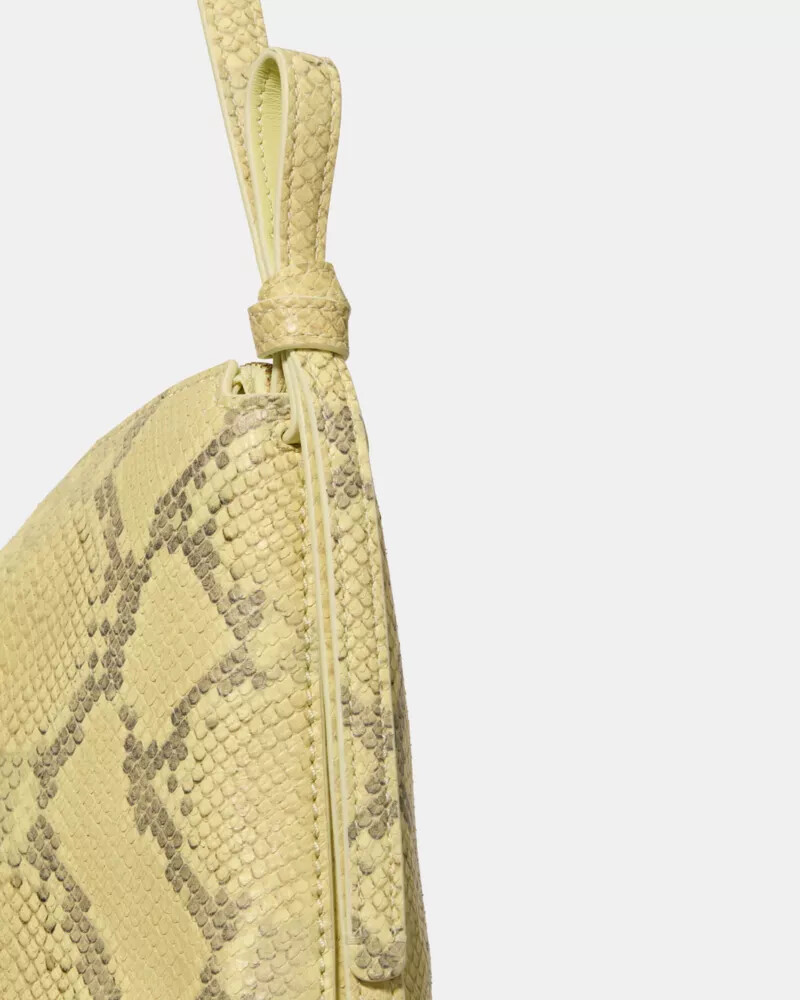 bolsa de ombro grande loop snake com relevo cor limão claro.