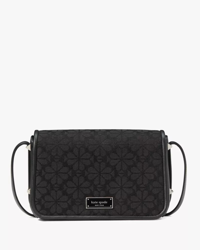 bolsa transversal liv spade com estampa floral em jacquard preta e multicolorida.