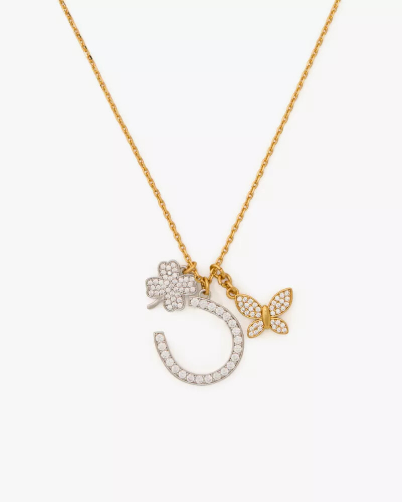 pingente lucky charm em tons neutros e multicoloridos