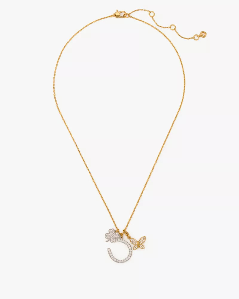 pingente lucky charm em tons neutros e multicoloridos