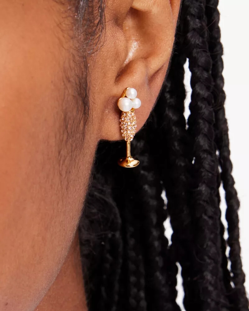 um brinde ao champanhe studs. ouro