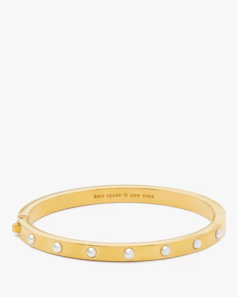 bracelete articulado com engaste em pedra em ouro branco.