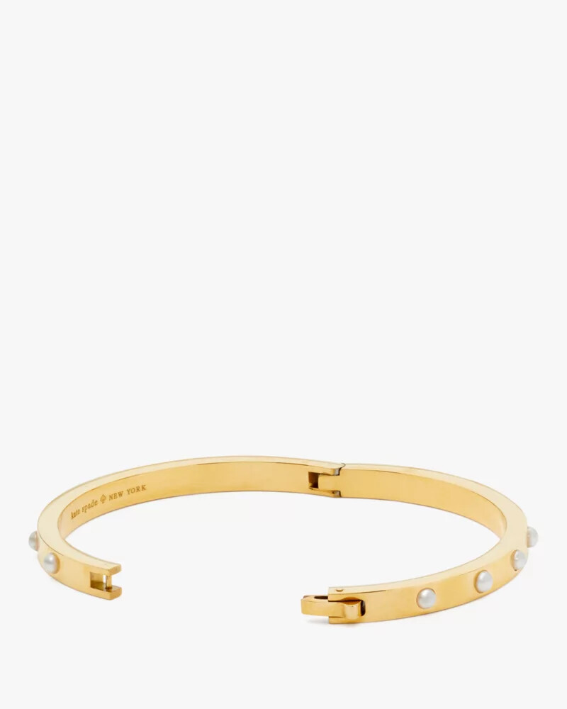 bracelete articulado com engaste em pedra em ouro branco.