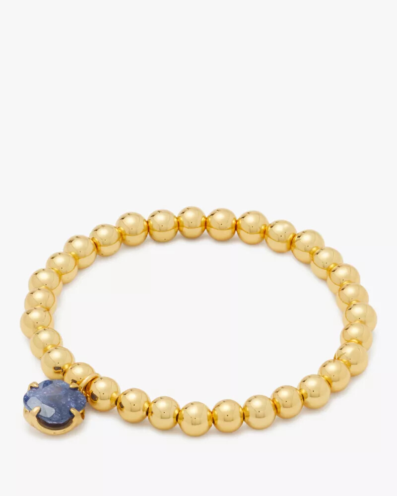 pulseira elástica pop of joy com flor de espadas azul marinho escuro