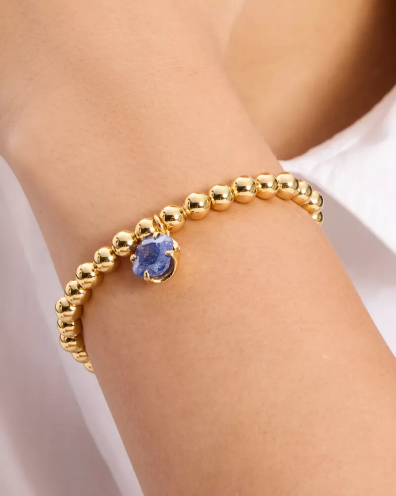 pulseira elástica pop of joy com flor de espadas azul marinho escuro