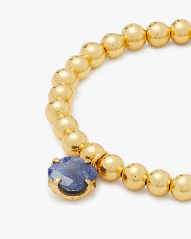 pulseira elástica pop of joy com flor de espadas azul marinho escuro