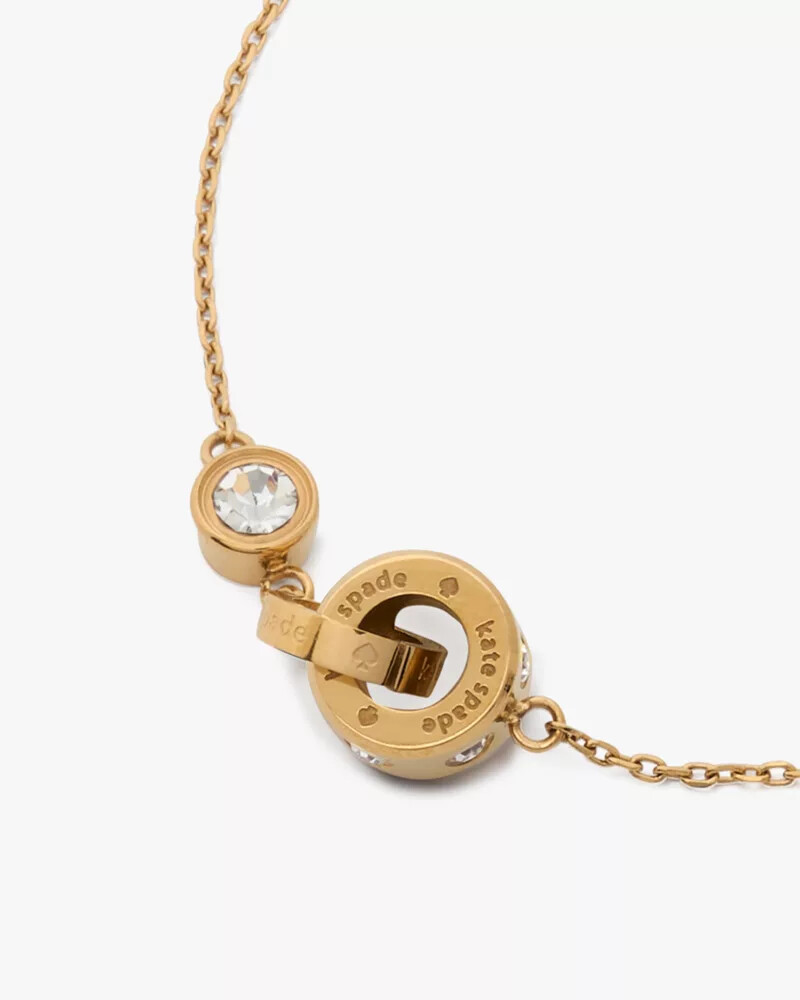 pulseira set in stone interlink dourada transparente