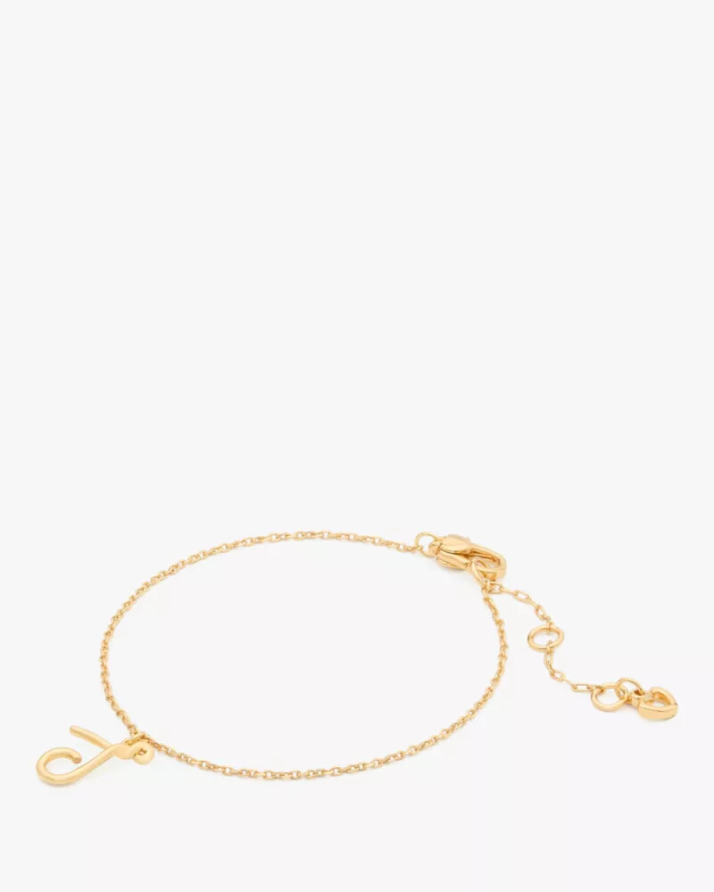 pulseira dourada com inicial em estilo cursivo