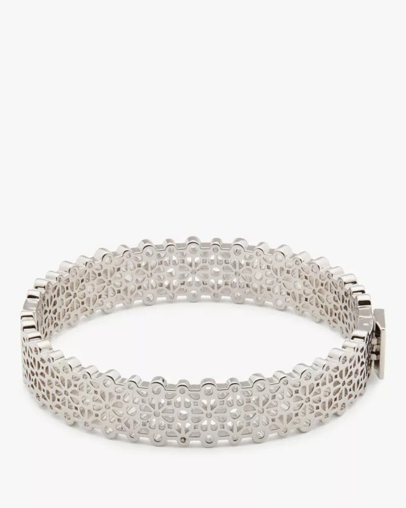 pulseira fina de renda com flor de espadas prateada