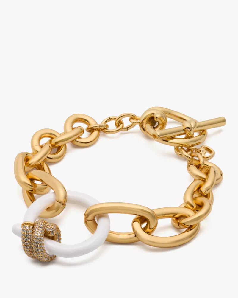 pulseira statement com cordas e nós em tons neutros multicoloridos