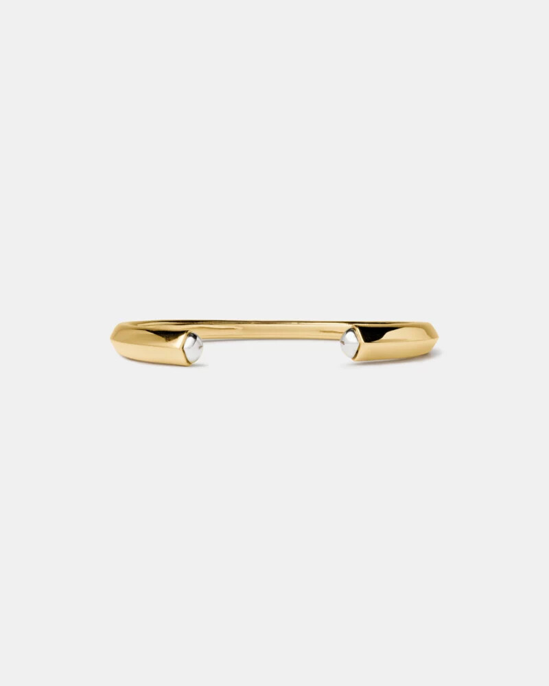 bracelete esculpido em formato de espada dourado e prateado