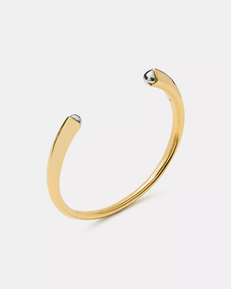 bracelete esculpido em formato de espada dourado e prateado