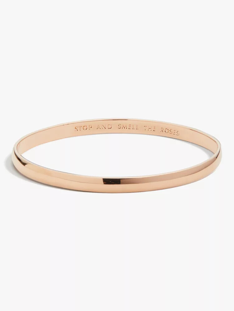 pulseira com a frase pare e aprecie o aroma das rosas em ouro rosa
