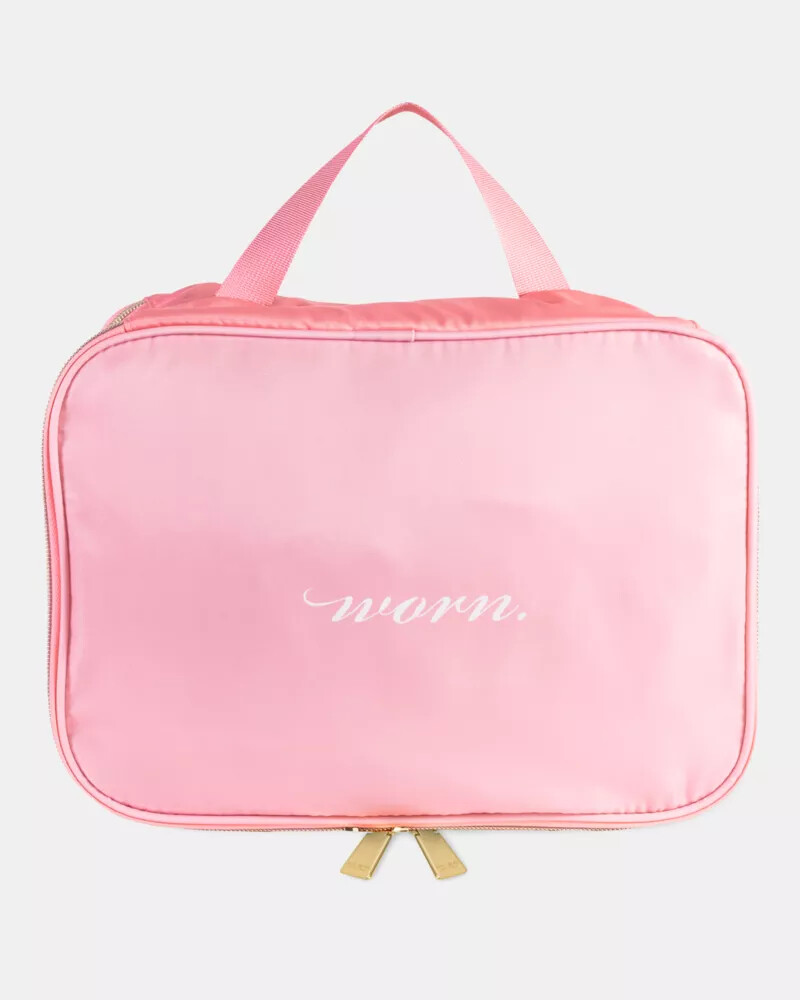 sacola de lavar roupa rosa usada
