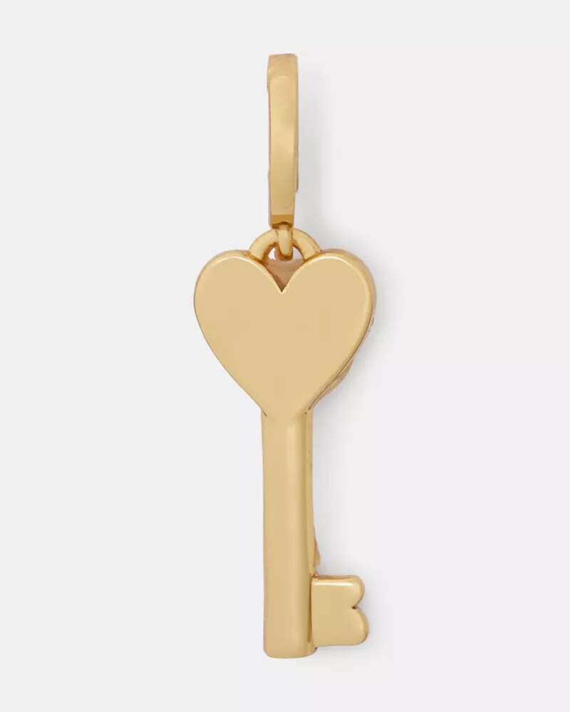 pingente de chave dourado