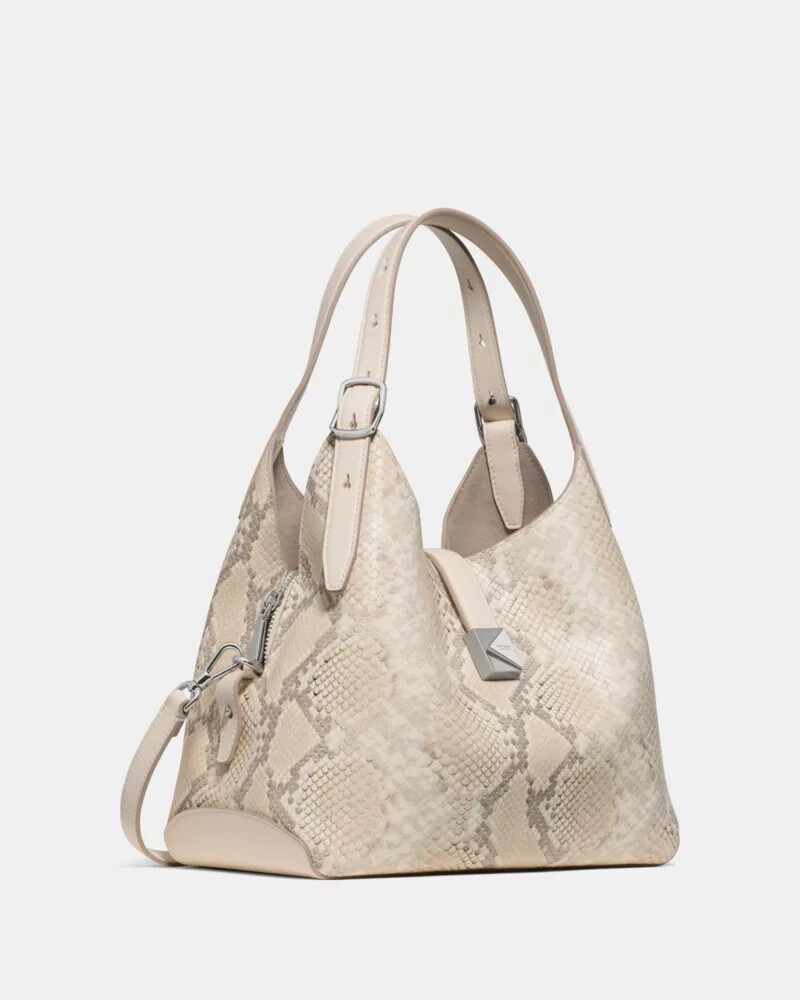 bolsa transversal deco snake com estampa em relevo neutra e multicolorida.