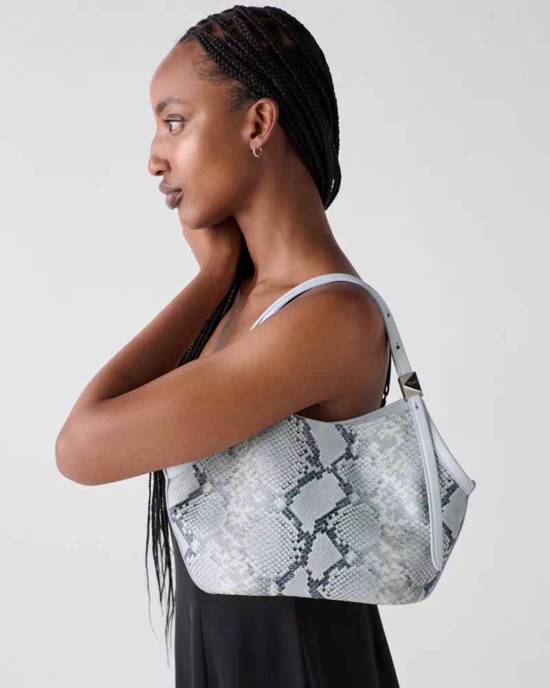 bolsa pequena tulipa com estampa de cobra decorativa em relevo cor safira clara.