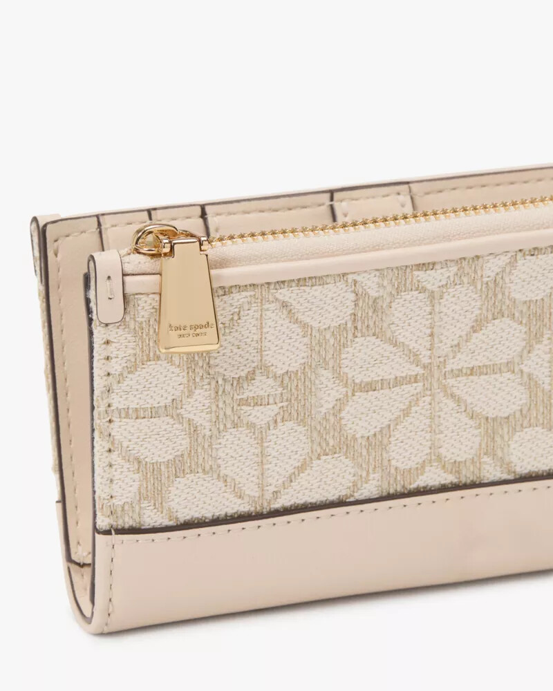 carteira dobrável devin spade com estampa floral em jacquard cor natural multicolorida.