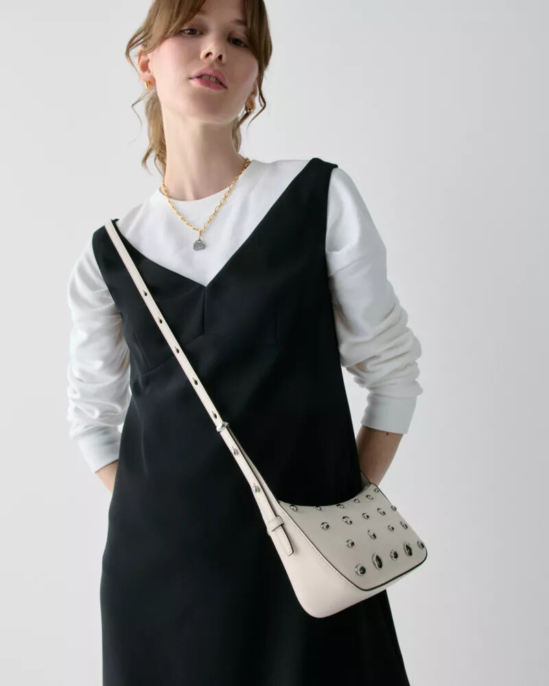 bolsa transversal halo tachas creme